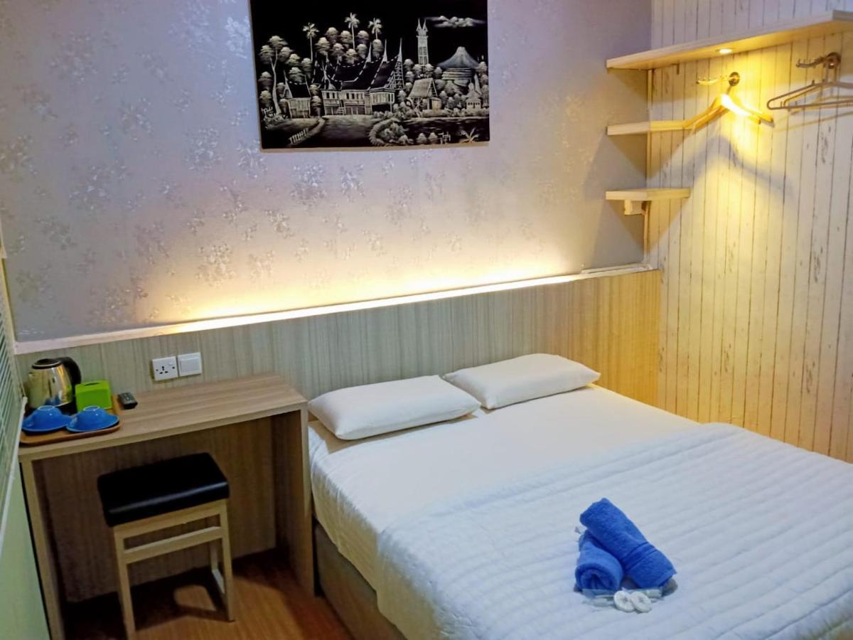 Sleeprest @ Golden Prima Batam Quarto foto