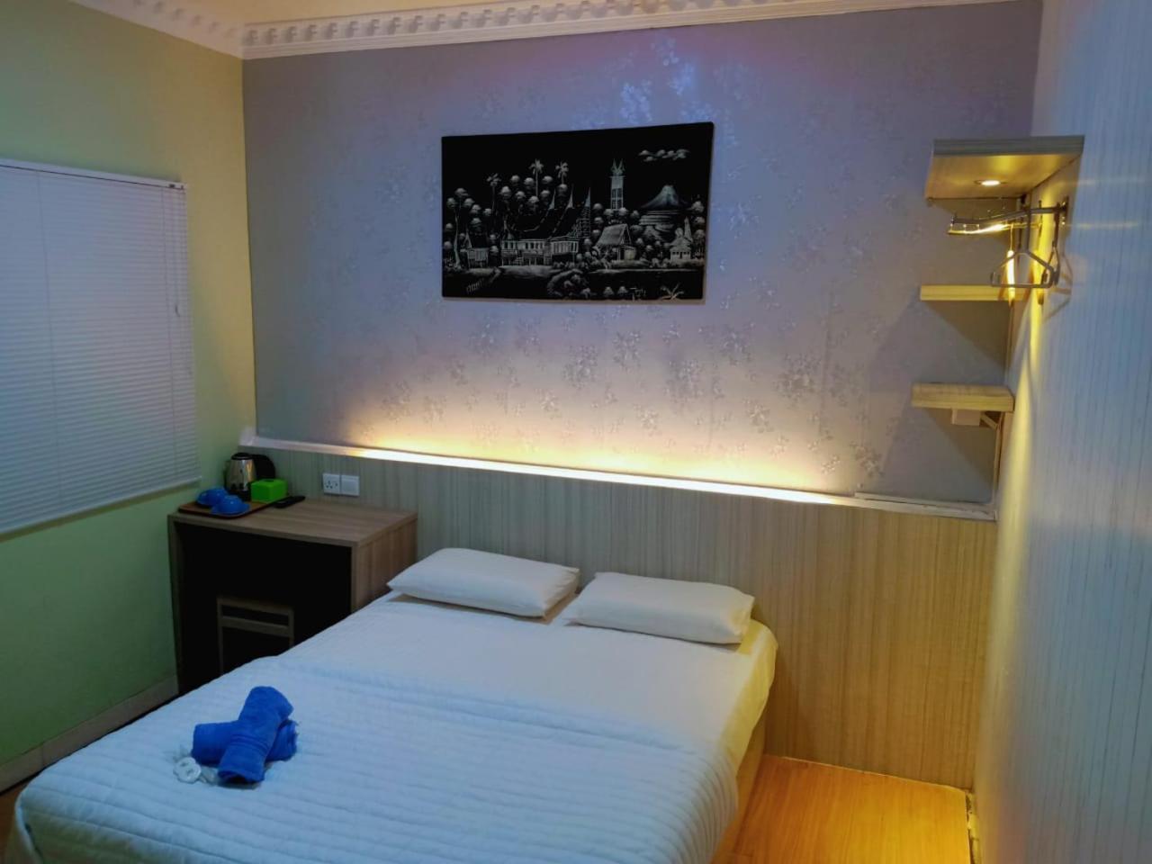 Sleeprest @ Golden Prima Batam Quarto foto